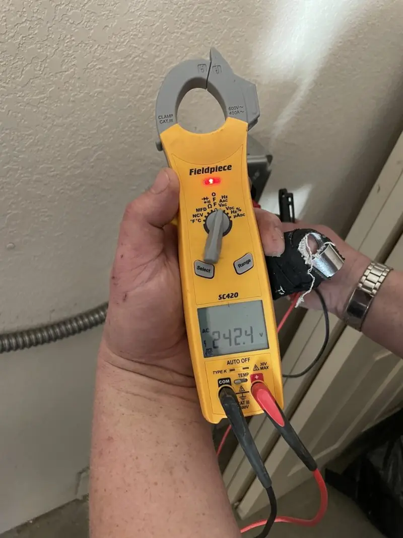Voltage testing with clamp meter during Generator Installation in Kingston